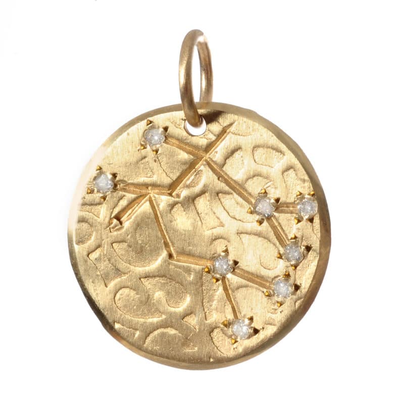 Gemini gold charm by Page Sargisson an Angela Leslie represented jewelry designer
