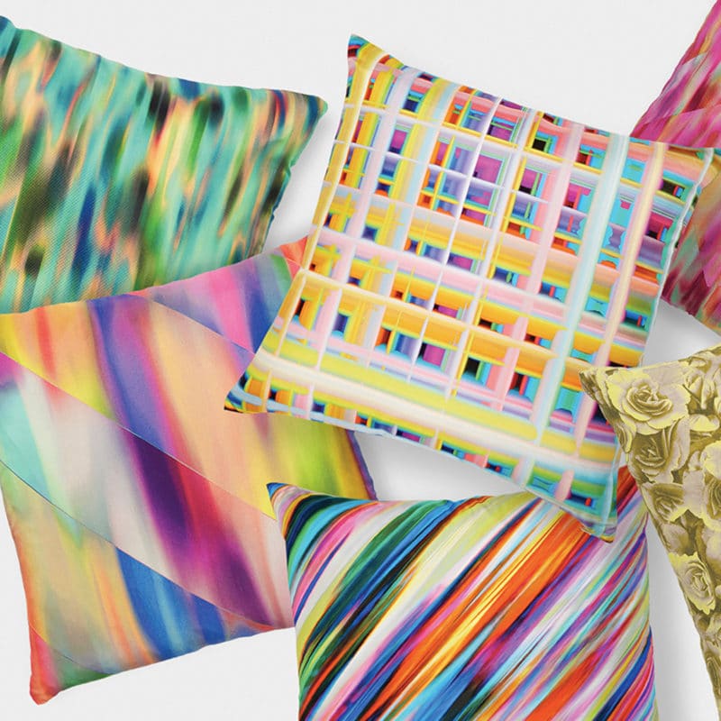Silk throw pillows designed by Ana Romero
